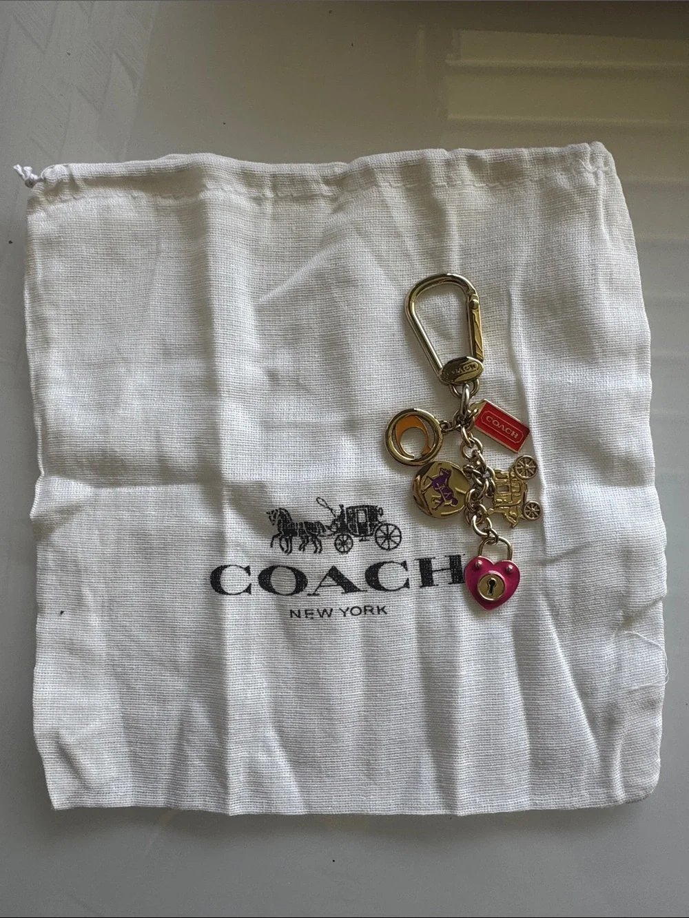 Coach Gold-Tone Multi Charm Keychain with Pink Heart and Red Tag